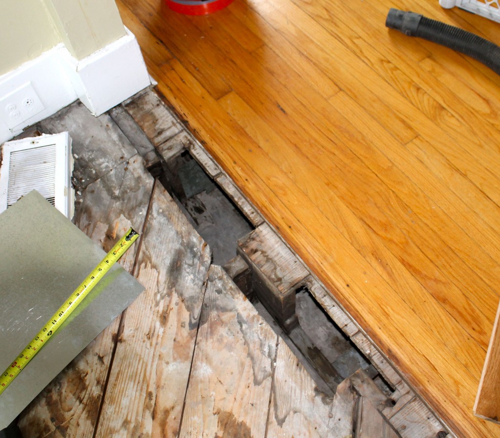 Floor hole 1024x897 - We Installed Some Floors!!!