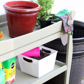 Baby changing table into a potting bench.