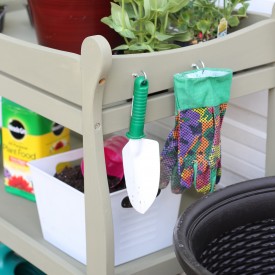 Baby changing table into a potting bench.